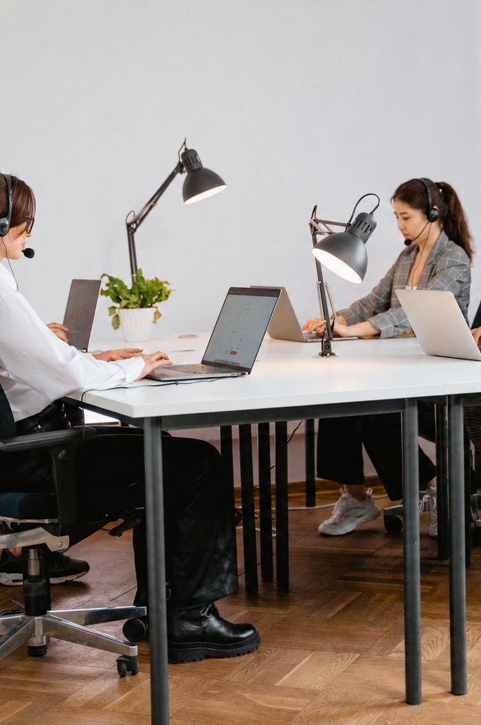 Call centre agents working at desks